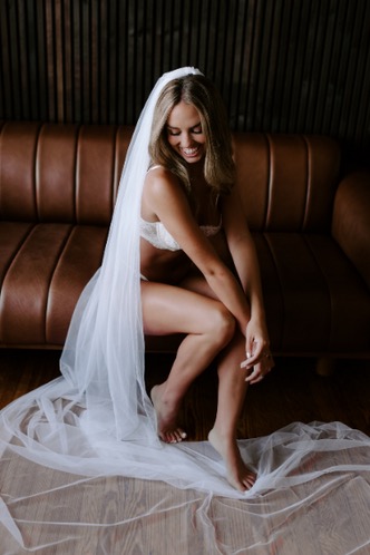 Bridal boudoir portrait with a veil