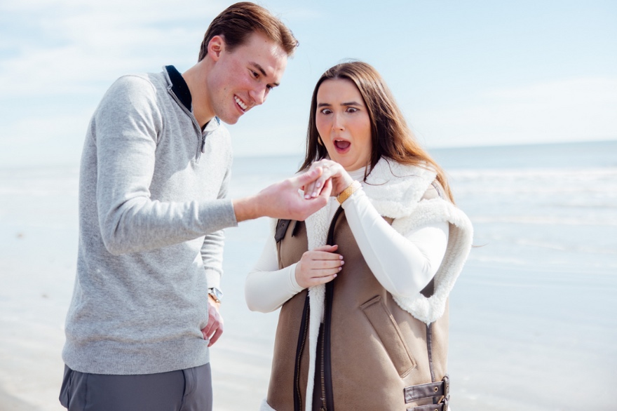 Newly engaged couple celebrating together