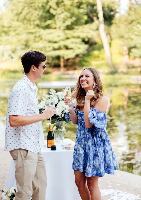 Newly engaged couple celebrating together